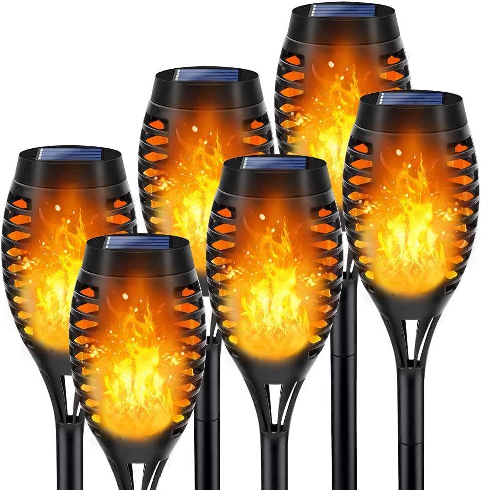 Installing LNRYY Solar Torch Lights Outdoor Waterproof Garden Decor on a garden pathway
